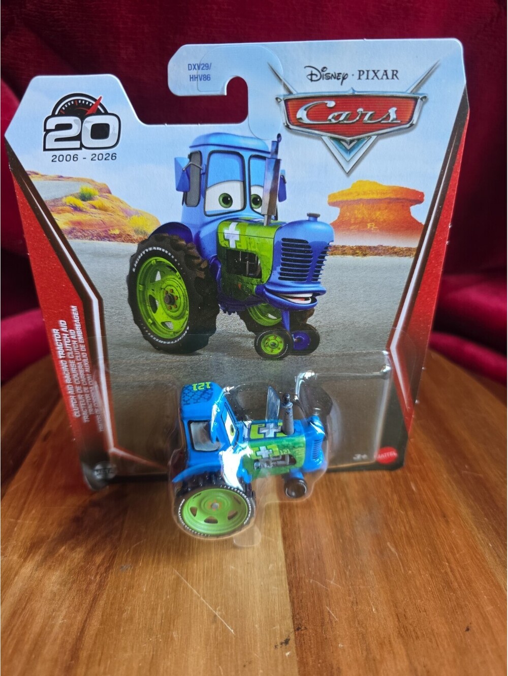 Disney Pixar Cars Clutch Aid Racing Tractor 20th New NIP
